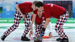 Norwegian curlers bowl during the 2010 Vancouver Olympics -- the men's team took home the silver medal that year.