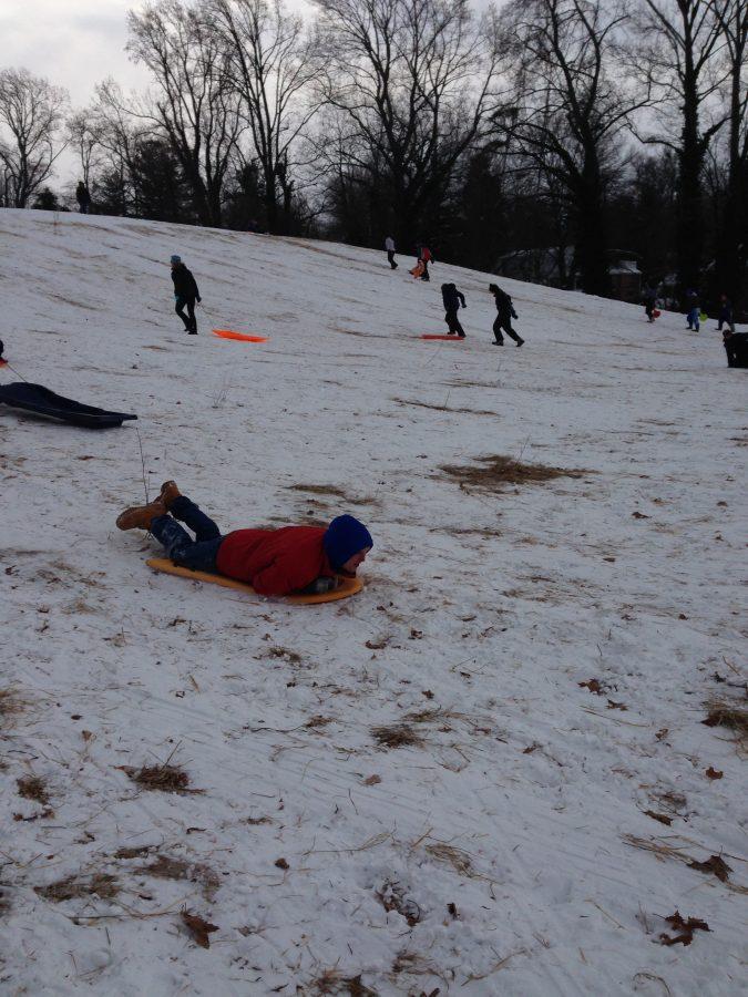 Students sled during snow days