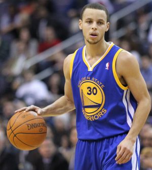 Warriors guard Stephen Curry handles the ball. The Warriors potent offense runs through Curry, and his MVP performance has put the Warriors one game away from basketball's ultimate goal.