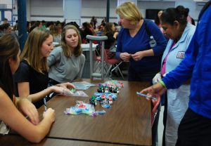 The Active Minds Club hosts their Winter "Laugh More, Stress Less" week, inviting students to find paper presents hidden around school and cash them in for a prize.