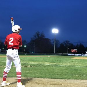 Senior outfielder Thomas Buckman prepares for his next at-bat at the Kyle’s Kamp game against Langley on Friday, April 1, 2016. The team defeated the Saxons 2-1. 