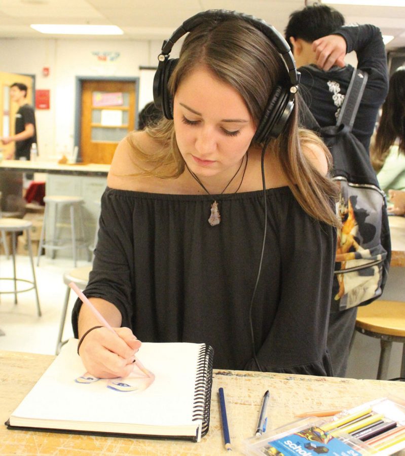Libby Ulrich gets in the zone by listening to alternative and rock music while making her art. 