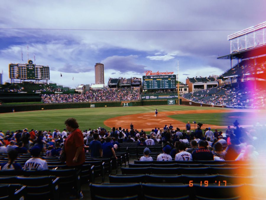 Huji added a unique filter, a cool light streak, and an analog date to a picture I took this summer at Wrigley Field. 