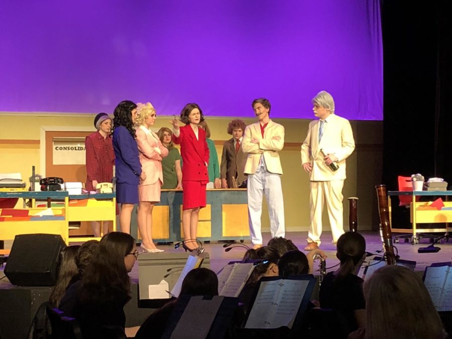 Abby Covington , Erica Bass,Haley Rose, Benji Harris and Trevor Hazen (12)  perform one of the final scenes of 9 to 5 on April 29. The performance received a standing ovation. (Photo courtesy of Lindsay Benedict)