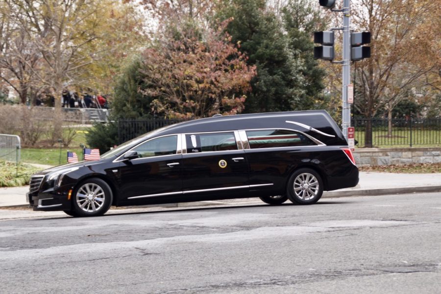George H.W Bush in the hearse, in front of National Cathedral