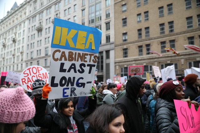 An young adult holds a sign to protest President Trump during the Womens March on Jan. 19, 2019. Recently, adolescents have been playing major roles in social and political movements such as Fridays for Future Climate Strike.