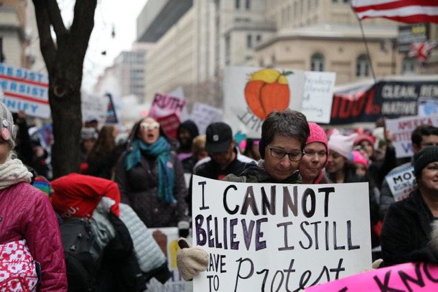 A woman is holding a sign that says I cannot believe I still have to protest. The Womens March of 2019 took place in D.C. on Jan. 19 after delays due to snow and government shutdown. 