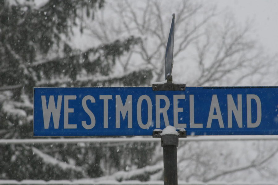 A street sign neighboring McLean endures the blizzard, effectively dispelling any question over school staying open.
