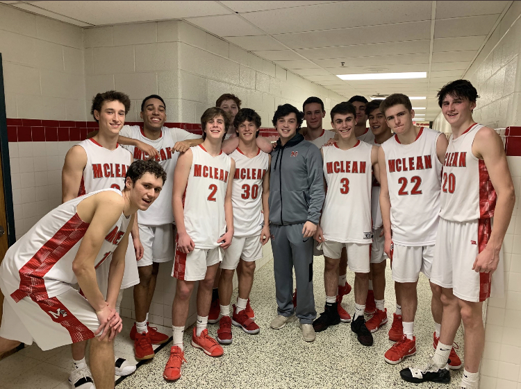 The McLean Highlanders mens basketball team pose for the cameras following their big win against South Lakes. 
(Photo courtesy of Greg Miller).