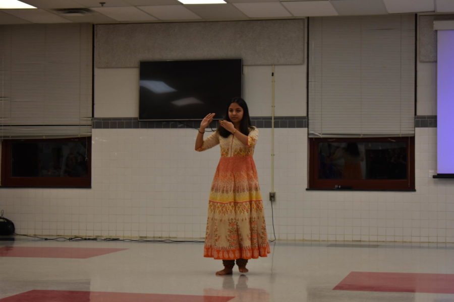 Students demonstrates native storytelling through dance.