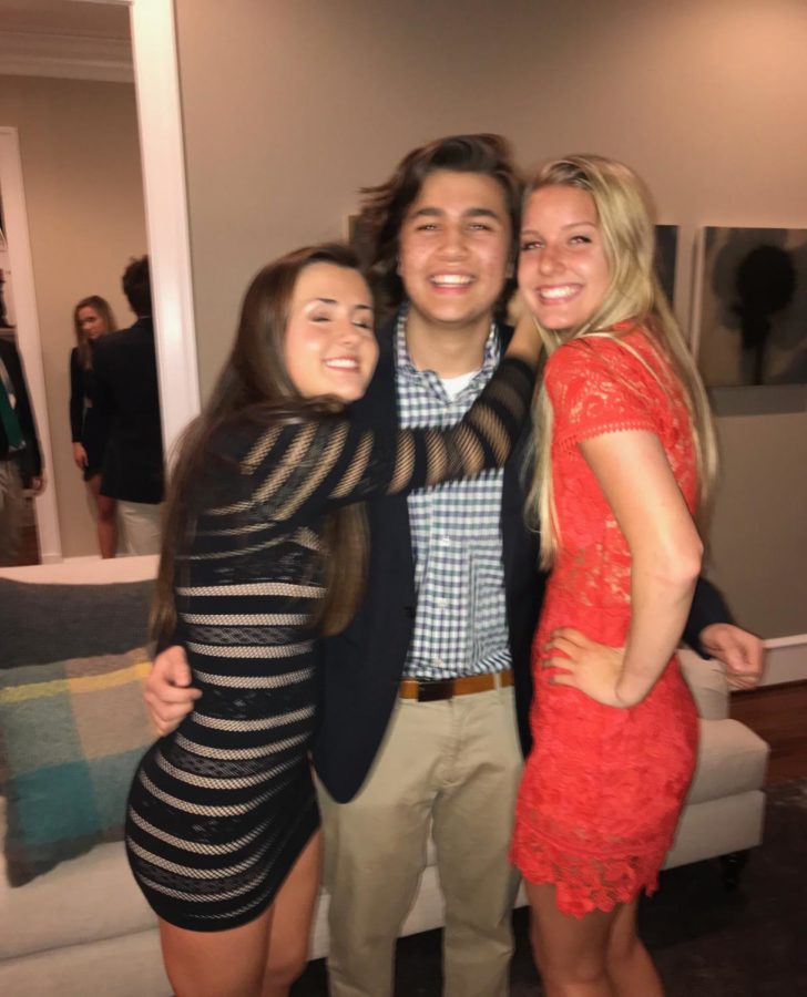 Juniors Sarah Rice, Camron Khaliq, and Lindsay Blum pose right before heading to last years winter formal  dance at McLean. (Photo courtesy of Sarah Rice) 