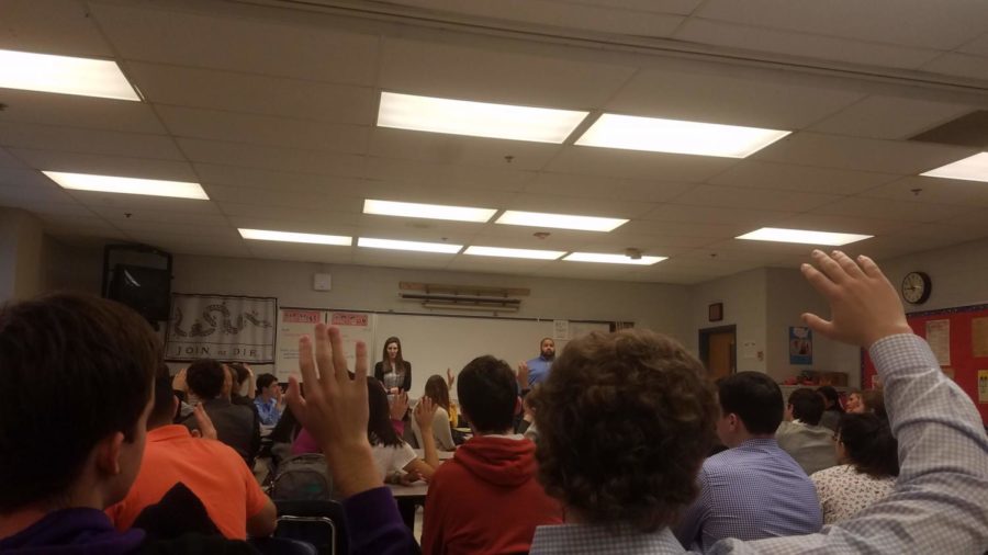 Hands go up as the regional admissions officers ask the juniors a question. This is during the first session of the Assess the Fit panel. (Photo taken By Jessica Opsahl-Ong)