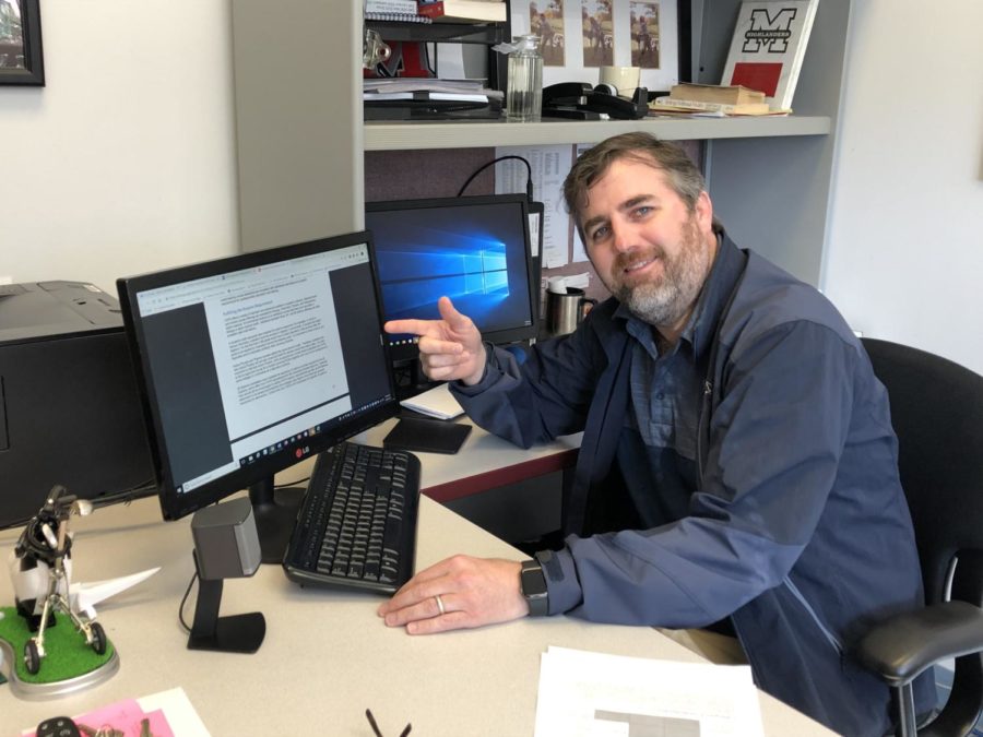 Counselor John Allman poses while working on students course selections on March 28. He has to make sure that students have a good balance between difficult classes and easy classes, and determining wether a student should take Chemistry or not is a major part of the process. 