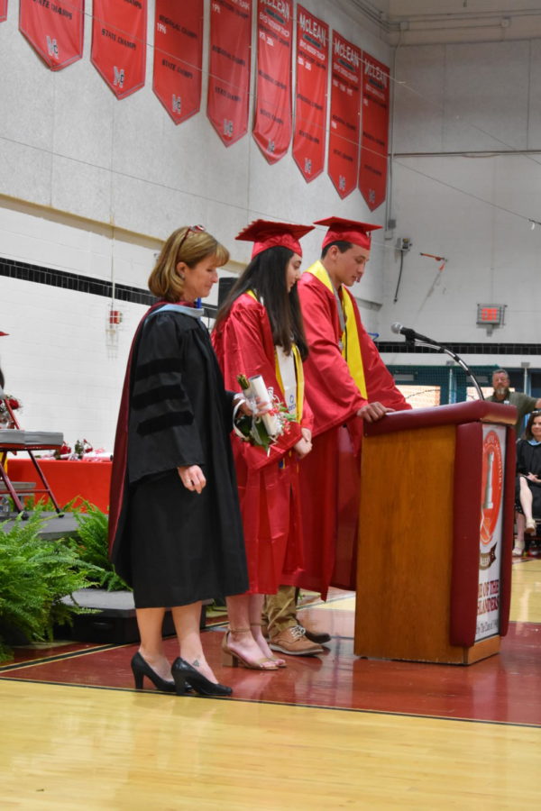 Senior Class Officers Elinor Frothingham and Aaron Hale stand beside Dr Ellen Reilly as they say thanks to all McLeans staff. 