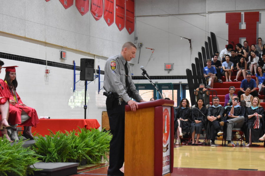 School Resource Officer Scott Davis stands before the students he has kept safe throughout their high school experience at McLean. 