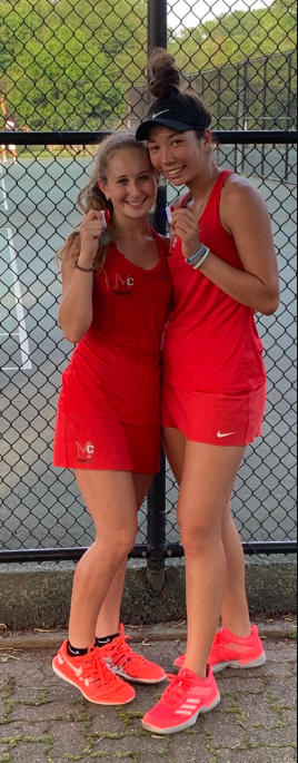 Dana Edson and Michelle Martinkov celebrate their second place win in the regional finals. 