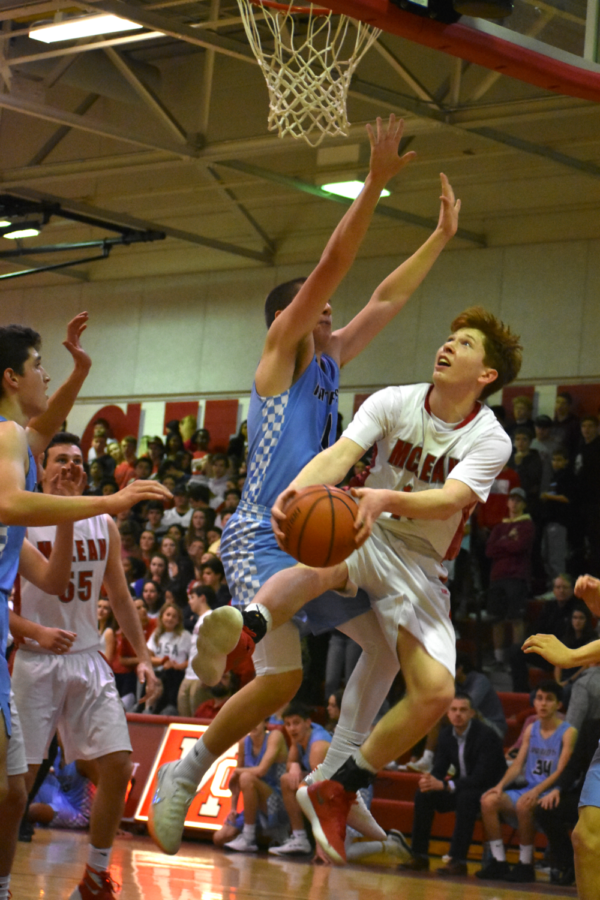Matias Prock jumps for a basket against the Yorktown team on Feb. 8. The Highlanders won that game 86-84.
