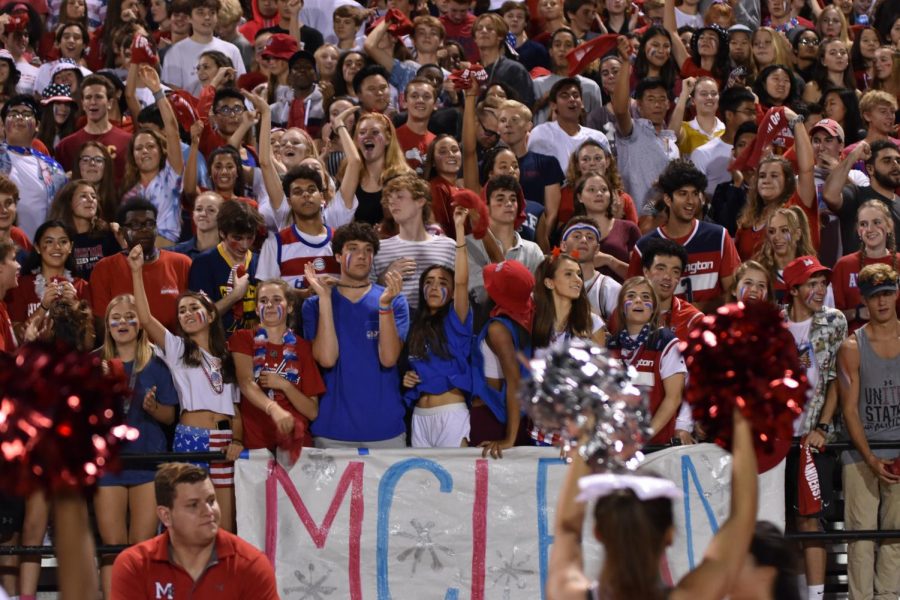 McLean+students+fill+the+stands+in+their+USA+gear.+McLeans+cheers+could+be+heard+the+whole+game.