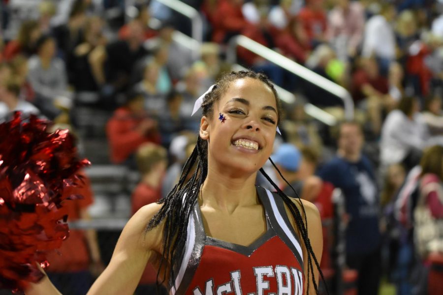 Elana Ellington cheers on the highlanders. The cheerleaders hyped up the crowd during the game