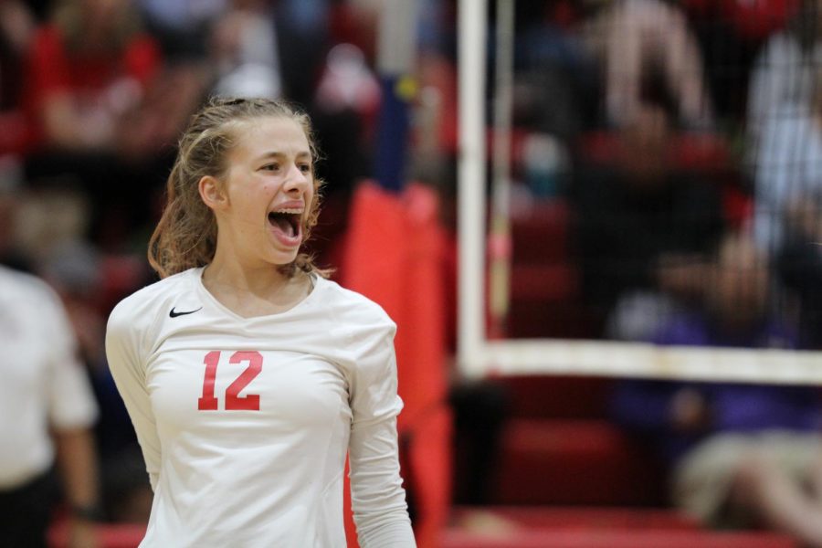 Sophomore Nicole Mallus gets excited after scoring a point against the visiting W-L team. The game occurred on Oct. 17.
