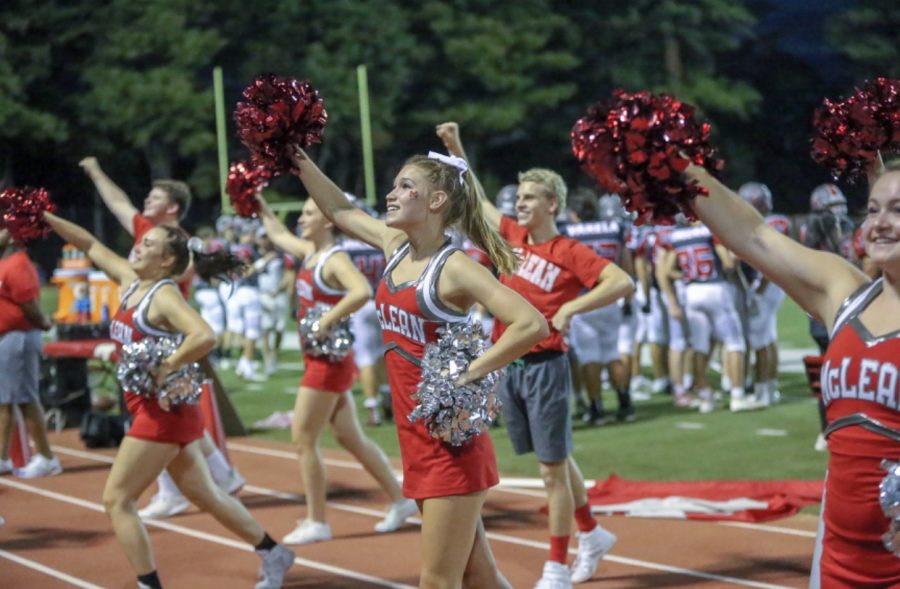 HOCO HYPE - McLean cheer team gets the crowed pumped for the Homecoming football game. I know the cheer team couldnt stand still because we were so excited, Kehoe said. 