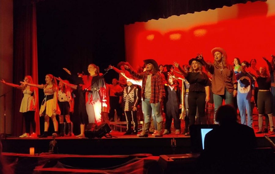 Chorus preforms The Ballad of Sweeney Todd at Halloween-themed concert. They are all decked out in costumes for the event. 