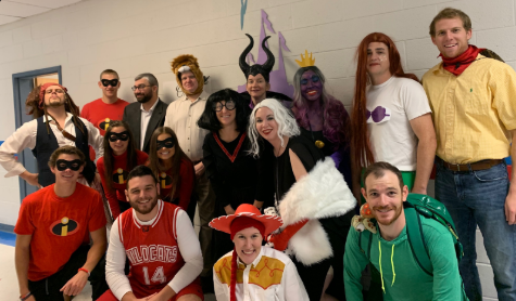 The social studies department dressed up as Disney characters.