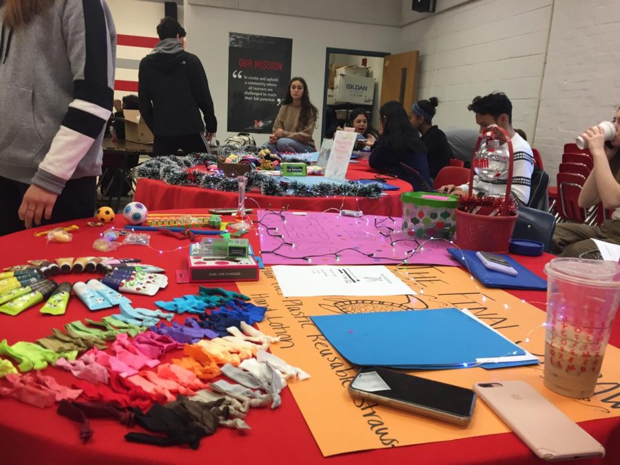 DECA students sit behind their class table pitching and selling their product. McLean students walk around the fair in hopes to find a product to buy