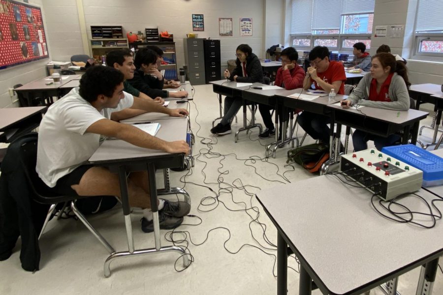 McLean’s quiz bowl team prepares to face off against Langley’s team in the VHSL district competition at Madison High School on Jan. 11.