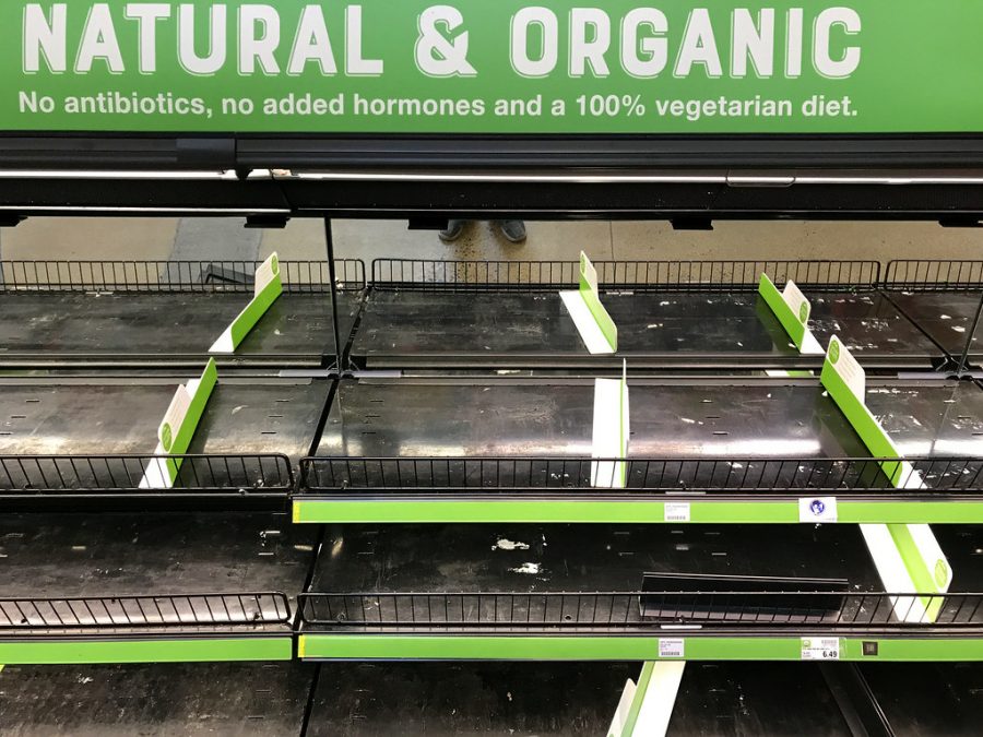 Food and other necessary supplies fly off the shelves as people prepare for the worst.