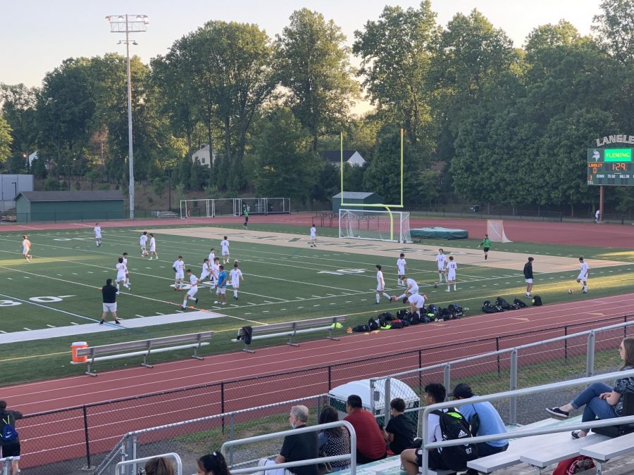 McLean High School boys varsity soccer team warming up before the game. Highlander takes on Saxons at Langley. 