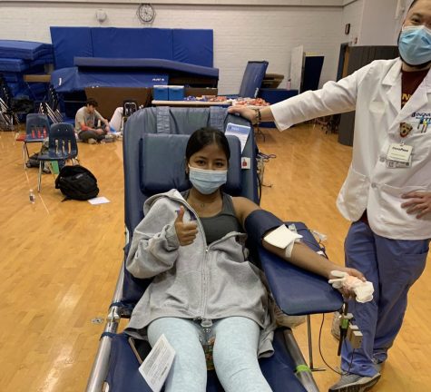 Senior Einmon Tha gets her blood drawn in the dance room on November 15th. “I decided to donate blood because I heard about this through [the] leadership [class], since we had to advertise and help people sign up,” Tha said. “I just thought it was a really great way to give back.”