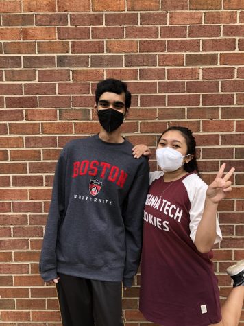 COMMITMENT DAY - Seniors Naveen Patury and Tisha Maskey pose in their college shirts. Both have committed to colleges and are excited for the next four years of their lives. 