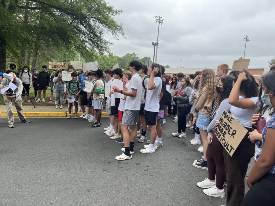 McLean students gathered near the front entrance to the school to raise awareness about the Uvalde shooting and protest the current gun laws of America.  
