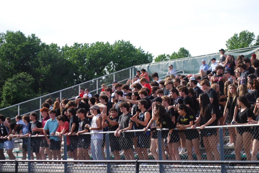McLean fans anxiously watch the field from the stands. The theme of the game was black out.