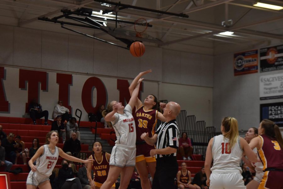 Senior Brooke Thomas wins the opening tip for McLean.
