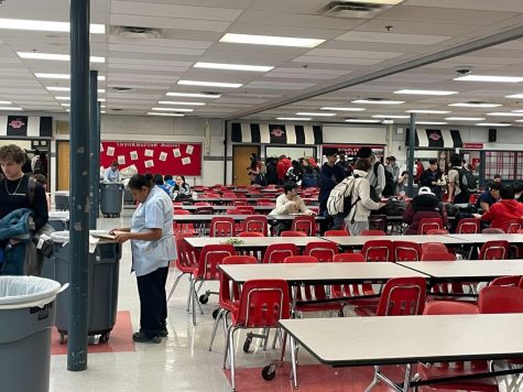 Students flood the cafeteria, lining up for food during lunches.