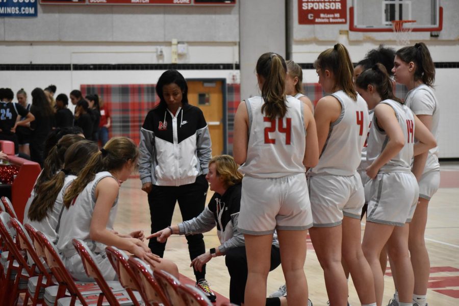 Head Coach Jenny Sobota rallies the Highlanders during one of the many timeouts throughout the game.