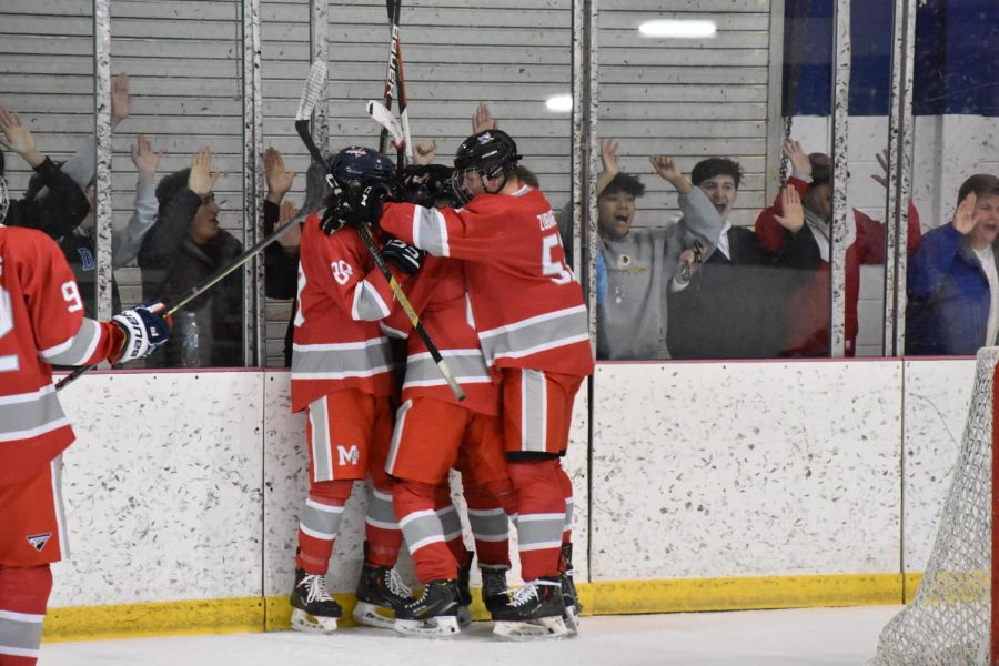 Highlander athletes and students celebrate alike after a vital 2nd-period goal.