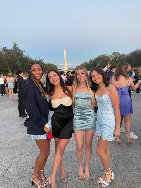 Seniors Anna Ntep, Ella Farivar, Emery Conroy and Maia Le pose in front of the Washington Monument on the night of the Homecoming dance, Oct. 21.