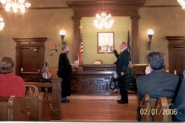 Government teacher Joshua Henry attends his swearing-in ceremony, inducting him as the mayor of Lewistown, Pennsylvania. His time as mayor fueled his passion for local government and politics.