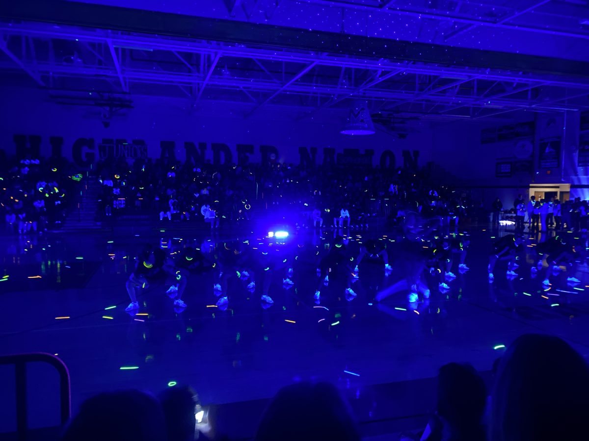 Student energy soars to an all-time high as the dance team begins their performance.