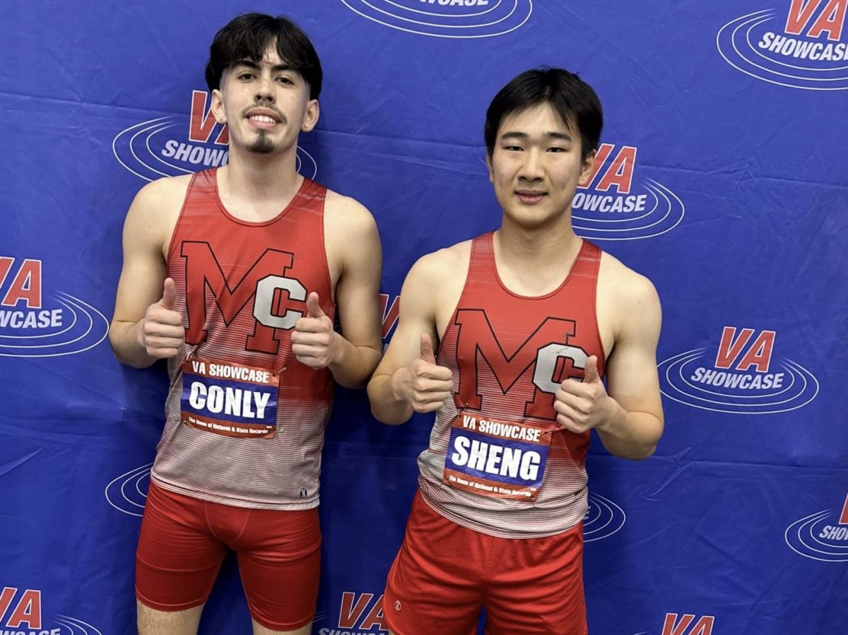 Andrew Colny (Left) and David Sheng (Right) after running their 300 meter races. Both ran very well and will be competing in districts on Feb. 1.