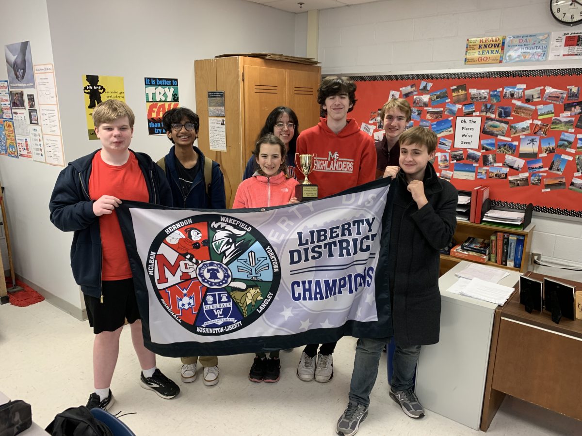 McLean quiz bowl poses with their trophy after winning districts last Saturday. They hope to win again tonight at regionals.