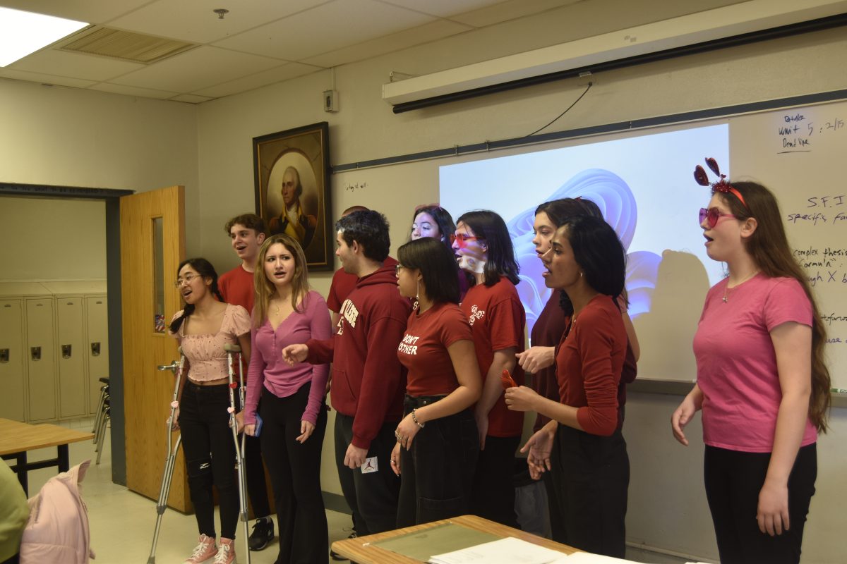 Chorus students perform across the school as part of the Singing Valentines program. Students bought Singing Valentines for others, and on Valentines Day they are serenaded. 