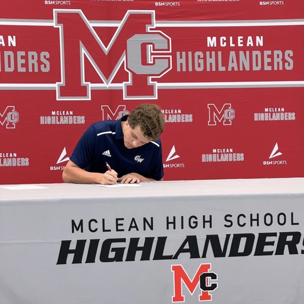 Carey signs his official National Letter of Intent to play baseball at GW University this fall at McLeans fall signing day on Nov. 11.