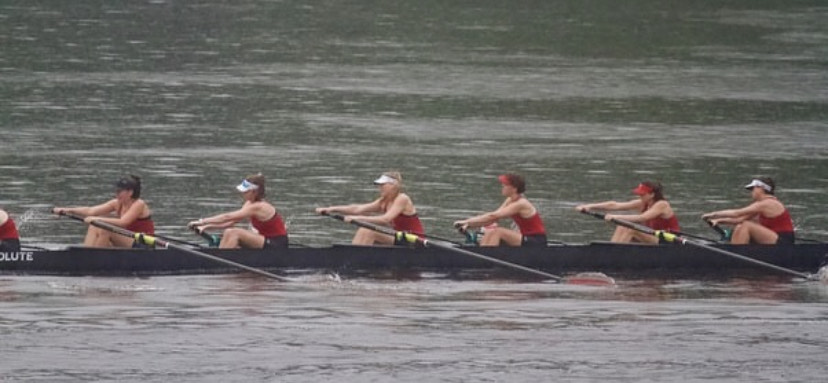 Senior+Ava+Kucko+rows+with+her+boat+group+in+the+2023+state+competition