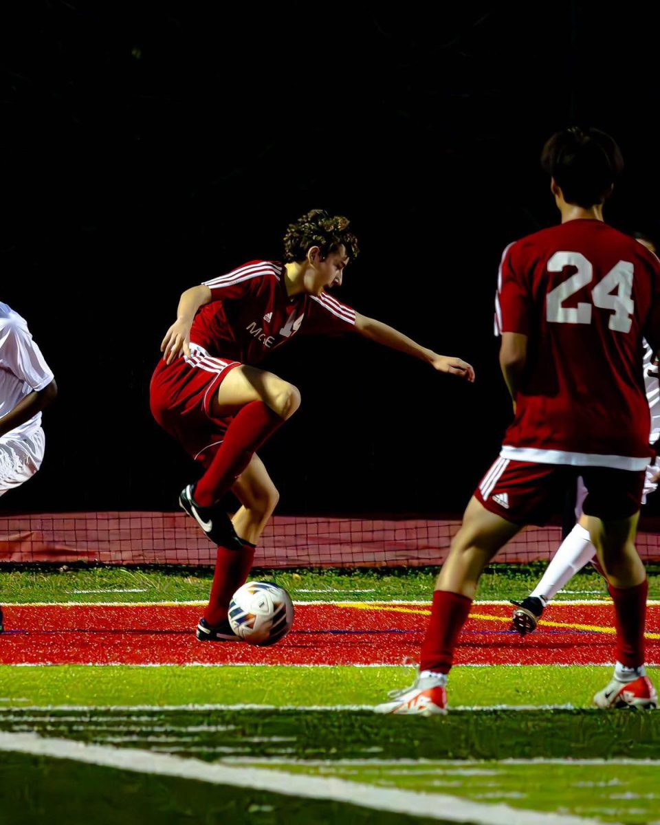 JV midfielder Saul Guiterres-Zorrilla Saiz takes possession of the ball, flanked by center-midfielder Josh Barnes, number 24. The Highlanders would go on to win the night with a 5-0 and 13-0 victory respectively for JV and varsity.
