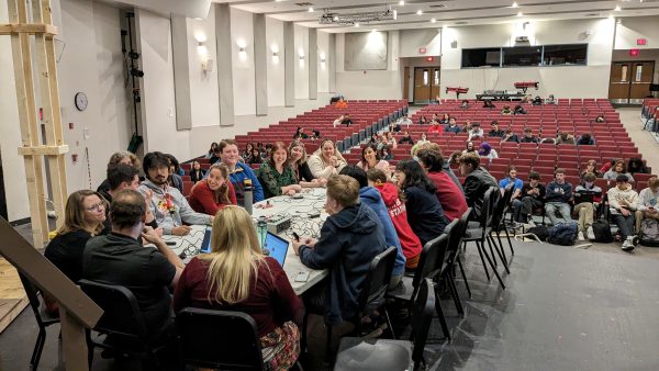 Students spectate as McLeans Quiz Bowl team plays a match against teacher volunteers. Students interested in Quiz Bowl can participate in Trivia Night on April 12.
