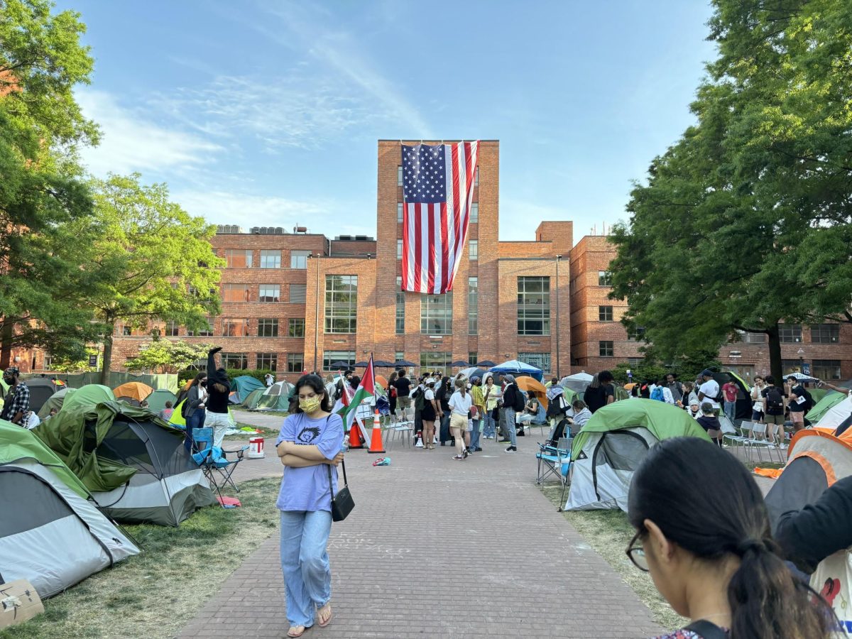 An image capturing the George Washington campus U-yard encampment before being taken down on May 8. The immediate community has felt the impacts of student activism and the conflict itself in varying ways.  